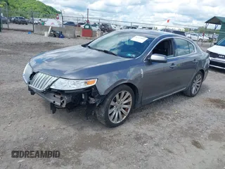 2011 Lincoln MKS EcoBoost with VIN 1LNHL9FT3BG610366, listed as a IAAI auction lot 42274043 with 196,811 mi miles and . Bid and sale history available at DreamBid. Image 2.
