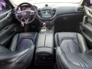 2014 Maserati Ghibli z VIN ZAM57XSA6E1097525, wystawiony jako Copart lot #42029695 z przebiegiem 93 740 mil mil oraz Szkoda całkowita • Salvage title. Historia ofert i sprzedaży dostępna na DreamBid. Obrazek 8.