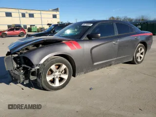 2014 Dodge Charger SXT with VIN 2C3CDXHGXEH275085, listed as a Copart auction lot 86730604 with 128,082 mi miles and Salvage Title. Bid and sale history available at carsss.com. Image 1.