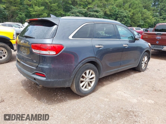 2017 Kia Sorento LX with VIN 5XYPG4A56HG230935, listed as a IAAI auction lot 42593196 with 127,425 mi miles and . Bid and sale history available at DreamBid. Image 4.