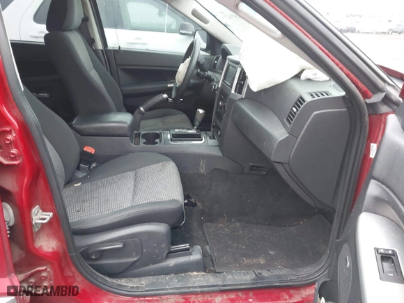 2009 Jeep Grand Cherokee Laredo with VIN 1J8GR48K99C549346, listed as a IAAI auction lot 41870627 with 170,949 mi miles. Bid and sale history available at carsss.com. Image 5.