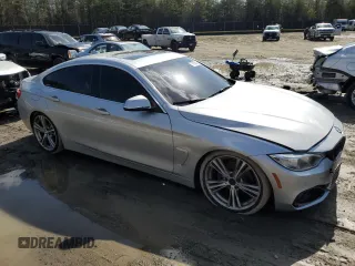 2016 BMW 4 Series 428i with VIN WBA4A9C58GGL89883, listed as a Copart auction lot 52114415 with 132,796 mi miles and Salvage Title. Bid and sale history available at carsss.com. Image 4.