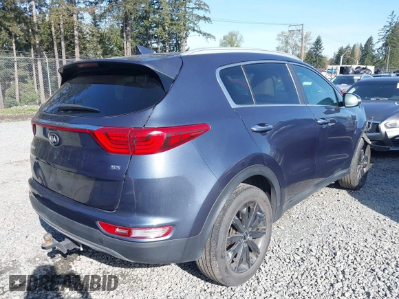 2019 Kia Sportage EX with VIN KNDPNCAC7K7615908, listed as a IAAI auction lot 42004220 with 86,654 mi miles. Bid and sale history available at carsss.com. Image 4.