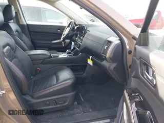 2023 Nissan Pathfinder Platinum with VIN 5N1DR3DH3PC273947, listed as a IAAI auction lot 41253438 with 13,101 mi miles and . Bid and sale history available at DreamBid. Image 5.