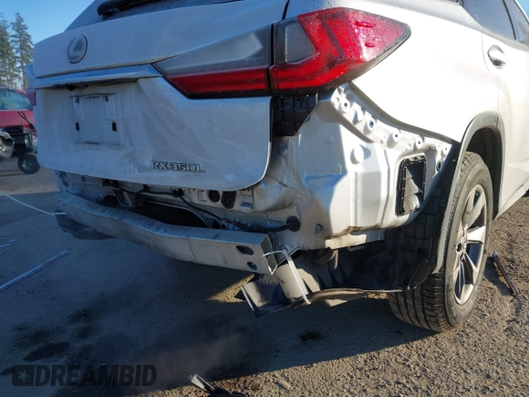 2018 Lexus RX 350L Premium z VIN JTJDZKCAXJ2008164, wystawiony jako IAAI lot #41436168 z przebiegiem 126 798 mil mil oraz . Historia ofert i sprzedaży dostępna na DreamBid. Obrazek 18.