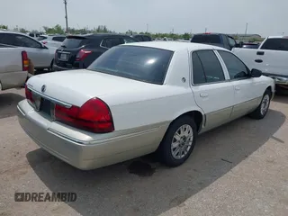 2004 Mercury Grand Marquis GS z VIN 2MEFM74W54X654116, wystawiony jako IAAI lot #41875021 z przebiegiem 129 999 mil mil oraz . Historia ofert i sprzedaży dostępna na DreamBid. Obrazek 4.