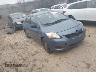 2009 Toyota Yaris with VIN JTDBT903494059539, listed as a IAAI auction lot 41036166 with 213,836 mi miles. Bid and sale history available at carsss.com. Image 1.