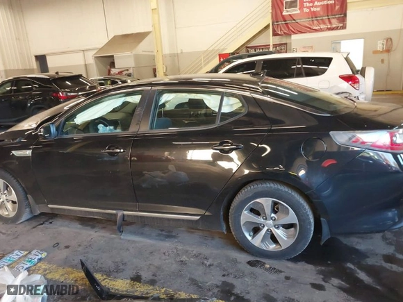 2015 Kia Optima Hybrid with VIN KNAGM4AD1F5083989, listed as a IAAI auction lot 41013875 with NaN miles. Bid and sale history available at carsss.com. Image 15.