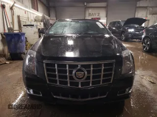 2014 Cadillac CTS Performance z VIN 1G6DG1E37E0103321, wystawiony jako Copart lot #52013005 z przebiegiem 70 394 mil mil oraz Szkody całkowita. Historia ofert i sprzedaży dostępna na DreamBid. Obrazek 5.