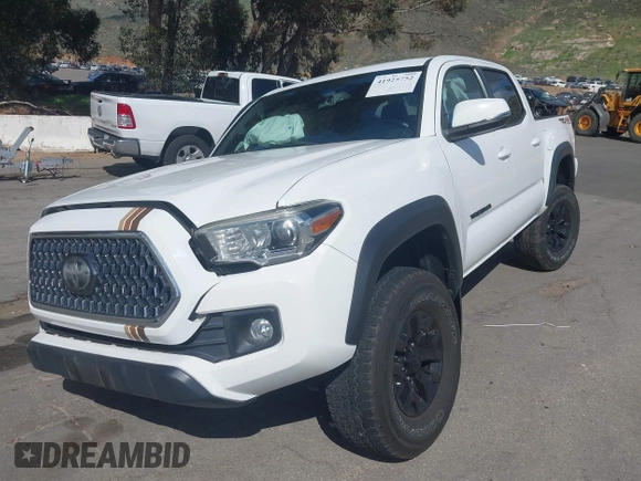 2019 Toyota Tacoma SR z VIN 3TMCZ5AN5KM249582, wystawiony jako IAAI lot #41925752 z przebiegiem 108 417 mil mil oraz . Historia ofert i sprzedaży dostępna na DreamBid. Obrazek 18.