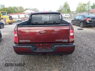 2010 Honda Ridgeline RTL with VIN 5FPYK1F57AB005602, listed as a IAAI auction lot 42208633 with 106,777 mi miles and . Bid and sale history available at DreamBid. Image 16.