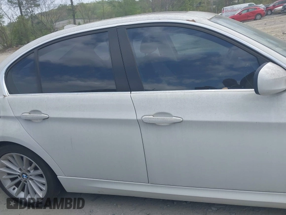 2011 BMW 3 Series 335i with VIN WBAPM5C51BE575704, listed as a IAAI auction lot 42005354 with 205,263 mi miles. Bid and sale history available at carsss.com. Image 12.