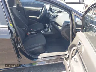 2014 Ford Fiesta SE with VIN 3FADP4BJ1EM204083, listed as a IAAI auction lot 42149088 with 136,209 mi miles and . Bid and sale history available at DreamBid. Image 5.