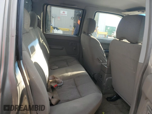 2004 Nissan Frontier XE with VIN 1N6ED29X24C455875, listed as a Copart auction lot 88430605 with 228,936 mi miles and Salvage title. Bid and sale history available at DreamBid. Image 10.