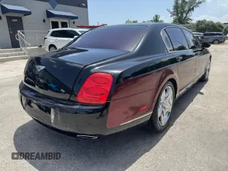 2006 Bentley Flying Spur z VIN SCBBR53W96C031785, wystawiony jako Copart lot #61819345 z przebiegiem 58 606 mil mil oraz Szkoda całkowita • Salvage title. Historia ofert i sprzedaży dostępna na DreamBid. Obrazek 3.