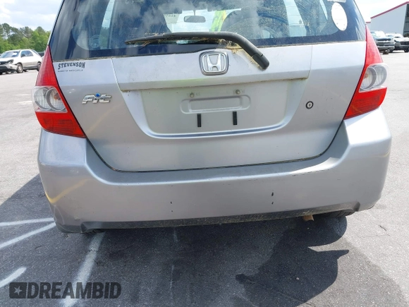 2008 Honda Fit z VIN JHMGD38438S030619, wystawiony jako IAAI lot #42010052 z przebiegiem 147 588 mil mil oraz . Historia ofert i sprzedaży dostępna na DreamBid. Obrazek 6.