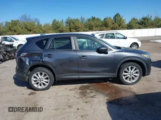 2014 Mazda CX-5 Grand Touring with VIN JM3KE4DY4E0320695, listed as a IAAI auction lot 41989350 with 169,391 mi miles and . Bid and sale history available at DreamBid. Image 14.