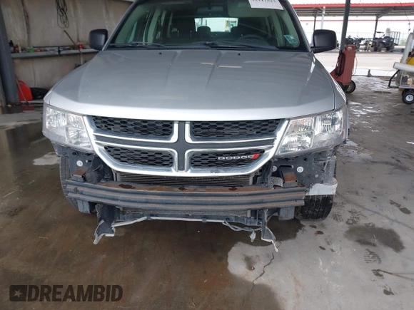 2014 Dodge Journey SE with VIN 3C4PDCAB1ET194066, listed as a IAAI auction lot 42117527 with 184,490 mi miles and . Bid and sale history available at carsss.com. Image 6.