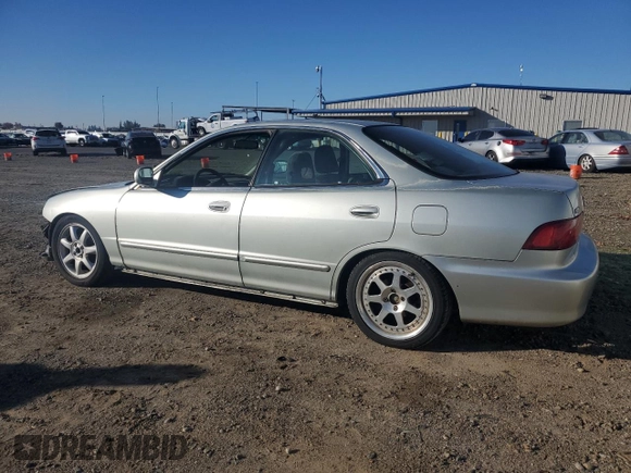 1998 Acura Integra LS with VIN JH4DB7659WS002591, listed as a Copart auction lot 84289584 with 316,458 mi miles and Salvage title. Bid and sale history available at DreamBid. Image 2.