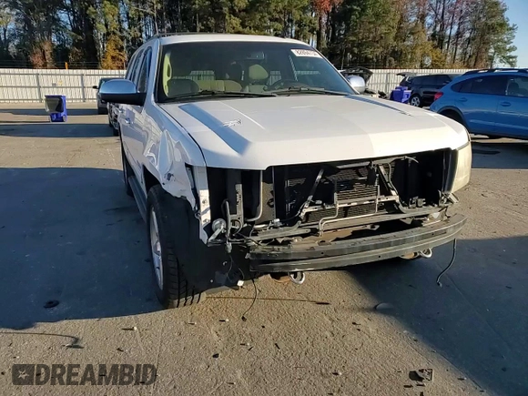 2013 Chevrolet Tahoe LS with VIN 1GNSCAE09DR340125, listed as a Copart auction lot 82894734 with 214,909 mi miles and Salvage title. Bid and sale history available at DreamBid. Image 11.