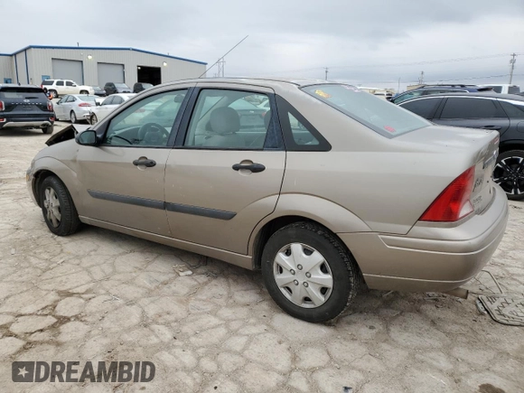 2003 Ford Focus LX with VIN 1FAFP33P73W114861, listed as a Copart auction lot 44859405 with 100,574 mi miles and Salvage Title. Bid and sale history available at carsss.com. Image 2.