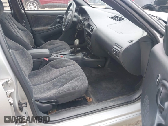 2003 Chevrolet Cavalier LS Sport z VIN 1G1JH52F137308603, wystawiony jako IAAI lot #42352102 z przebiegiem 56 837 mil mil oraz . Historia ofert i sprzedaży dostępna na DreamBid. Obrazek 5.