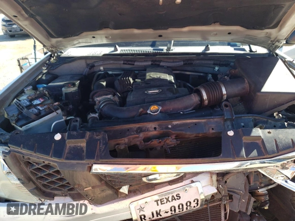 2012 Nissan Frontier SL z VIN 1N6AD0ER3CC450354, wystawiony jako Copart lot #80851824 z przebiegiem 188 276 mil mil oraz Szkoda całkowita • Salvage title. Historia ofert i sprzedaży dostępna na DreamBid. Obrazek 11.