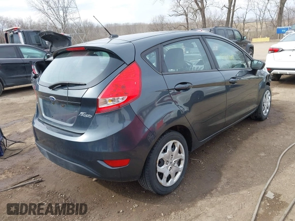 2011 Ford Fiesta SE with VIN 3FADP4EJ6BM137939, listed as a IAAI auction lot 41705008 with 161,166 mi miles. Bid and sale history available at carsss.com. Image 4.