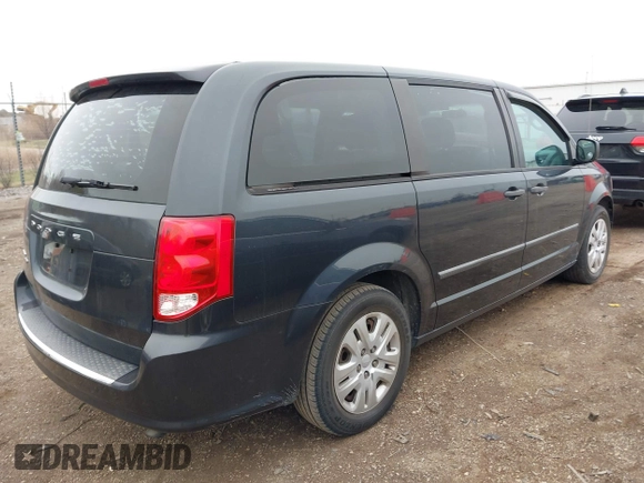 2014 Dodge Grand Caravan American Value with VIN 2C4RDGBG9ER463136, listed as a IAAI auction lot 41968032 with 184,138 mi miles and . Bid and sale history available at DreamBid. Image 4.
