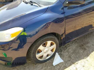 2009 Toyota Matrix z VIN 2T1KU40EX9C040282, wystawiony jako IAAI lot #42385430 z przebiegiem 185 179 mil mil oraz . Historia ofert i sprzedaży dostępna na DreamBid. Obrazek 6.