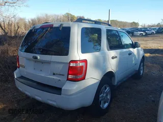 2009 Ford Escape Hybrid with VIN 1FMCU59309KA42631, listed as a IAAI auction lot 41809054 with 140,696 mi miles and . Bid and sale history available at DreamBid. Image 4.