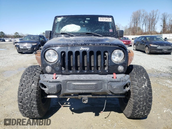 2016 Jeep Wrangler Unlimited Rubicon Hard Rock with VIN 1C4BJWFG9GL209484, listed as a Copart auction lot 87815475 with 85,729 mi miles and Salvage Title. Bid and sale history available at carsss.com. Image 5.