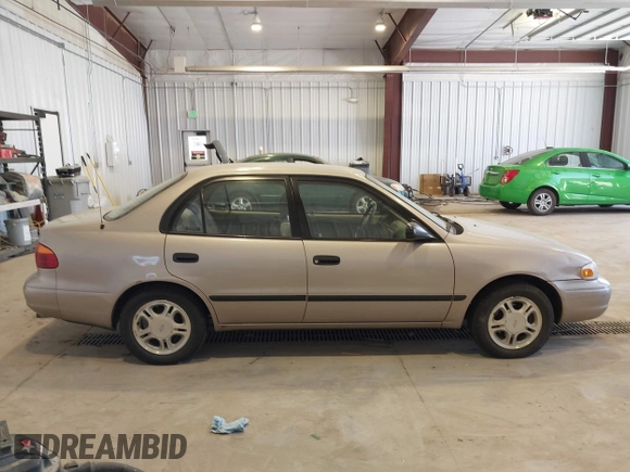 2001 Chevrolet Prizm z VIN 1Y1SK52811Z400984, wystawiony jako IAAI lot #42550019 z przebiegiem 226 246 mil mil oraz . Historia ofert i sprzedaży dostępna na DreamBid. Obrazek 13.