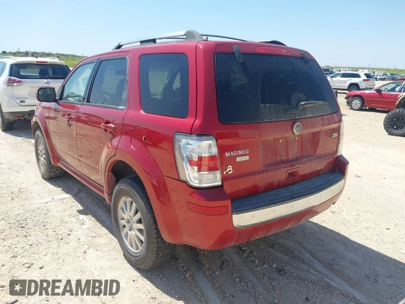 2011 Mercury Mariner Premier with VIN 4M2CN8HG3BKJ08774, listed as a IAAI auction lot 42007038 with 127,551 mi miles and . Bid and sale history available at DreamBid. Image 3.