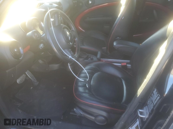 2015 MINI Countryman John Cooper Works with VIN WMWXD1C5XFWS34732, listed as a Copart auction lot 42402185 with Not Provided miles and Salvage Title. Bid and sale history available at DreamBid. Image 7.