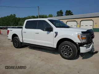 2023 Ford F-150 XL with VIN 1FTFW1E81PFA70563, listed as a Copart auction lot 60440685 with 31,198 mi miles and Salvage title. Bid and sale history available at DreamBid. Image 4.