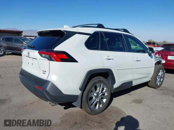 2023 Toyota RAV4 XLE Premium with VIN JTMA1RFV3PD097447, listed as a IAAI auction lot 41645983 with 14,416 mi miles. Bid and sale history available at carsss.com. Image 4.