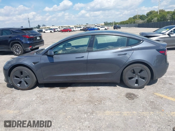 2023 Tesla Model 3 with VIN 5YJ3E1EA3PF623114, listed as a IAAI auction lot 41710385 with 31,663 mi miles and . Bid and sale history available at carsss.com. Image 14.