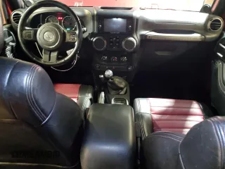 2012 Jeep Wrangler Unlimited Sport z VIN 1C4BJWDG8CL282181, wystawiony jako Copart lot #53863375 z przebiegiem 92 984 mil mil oraz Szkoda całkowita • Salvage title. Historia ofert i sprzedaży dostępna na DreamBid. Obrazek 8.