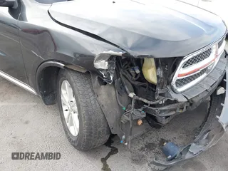 2012 Dodge Durango Crew with VIN 1C4SDHDT0CC321037, listed as a IAAI auction lot 42793232 with 162,593 mi miles and . Bid and sale history available at DreamBid. Image 6.