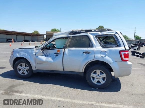 2011 Ford Escape Hybrid with VIN 1FMCU4K33BKB53300, listed as a IAAI auction lot 42561682 with 144,628 mi miles and . Bid and sale history available at DreamBid. Image 14.