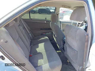2005 Toyota Camry STD z VIN 4T1BE32K65U994854, wystawiony jako IAAI lot #42137074 z przebiegiem 104 051 mil mil oraz . Historia ofert i sprzedaży dostępna na DreamBid. Obrazek 8.