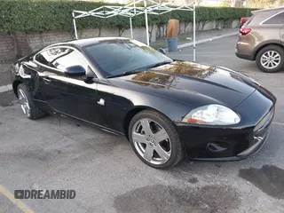 2008 Jaguar XK with VIN SAJWA43B985B23987, listed as a IAAI auction lot 41197091 with 54,803 mi miles. Bid and sale history available at carsss.com. Image 1.