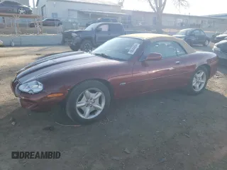 1999 Jaguar XK z VIN SAJGX2045XC031666, wystawiony jako Copart lot #86643694 z przebiegiem Nie podano mil oraz Szkody całkowita. Historia ofert i sprzedaży dostępna na DreamBid. Obrazek 1.