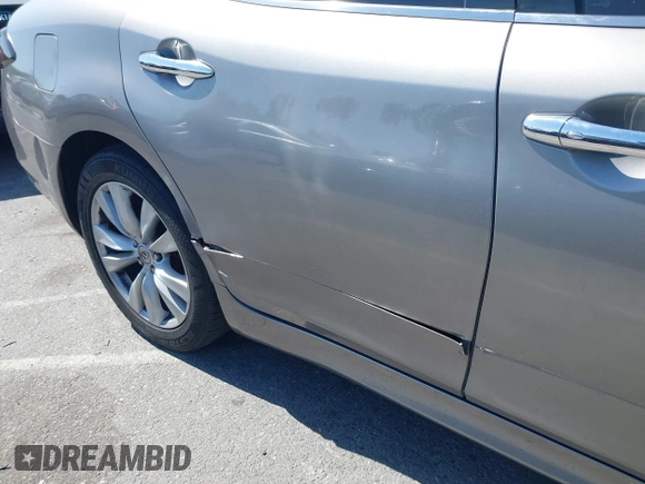 2011 Infiniti M with VIN JN1BY1AP7BM321776, listed as a IAAI auction lot 42320450 with 117,831 mi miles and . Bid and sale history available at DreamBid. Image 6.