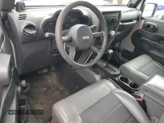 2008 Jeep Wrangler X z VIN 1J4FA24168L629174, wystawiony jako Copart lot #61199205 z przebiegiem 116 307 mil mil oraz Szkoda całkowita • Salvage title. Historia ofert i sprzedaży dostępna na DreamBid. Obrazek 8.