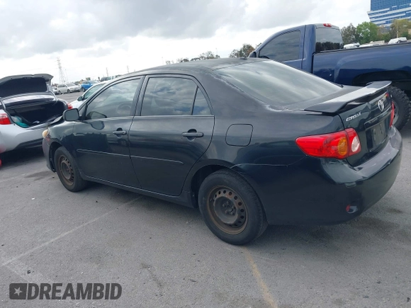 2009 Toyota Corolla with VIN 1NXBU40E59Z093650, listed as a IAAI auction lot 42121575 with 166,631 mi miles. Bid and sale history available at carsss.com. Image 14.