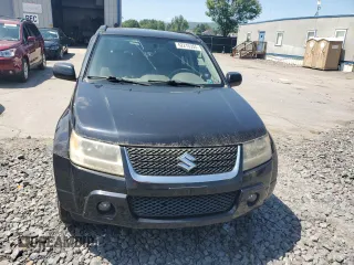 2009 Suzuki Grand Vitara with VIN JS3TD047994100405, listed as a Copart auction lot 62215355 with 127,756 mi miles and Clean title. Bid and sale history available at DreamBid. Image 5.