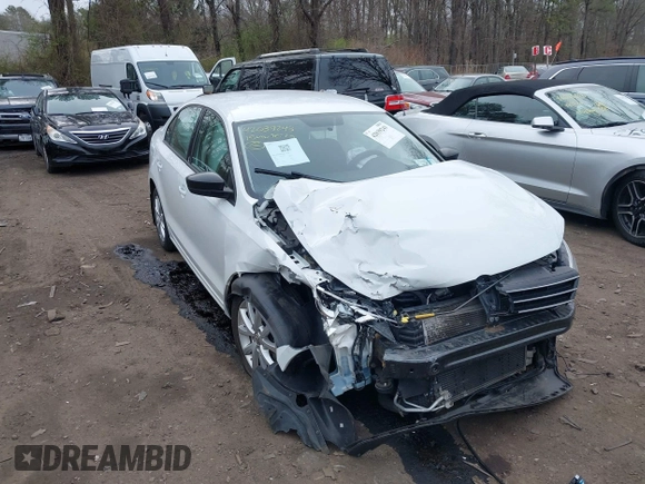 2015 Volkswagen Jetta Sedan 1.8T SE with VIN 3VWD17AJXFM334862, listed as a IAAI auction lot 42039243 with 94,996 mi miles. Bid and sale history available at carsss.com. Image 1.