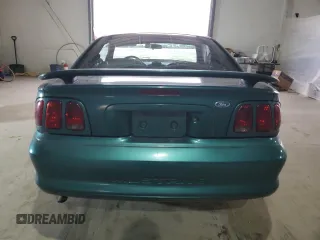 1996 Ford Mustang with VIN 1FALP4047TF229334, listed as a Copart auction lot 49257335 with 184,986 mi miles and Salvage Title. Bid and sale history available at carsss.com. Image 6.